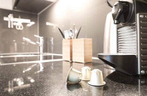 St. Gallen Apartment | Apartment deluxe orange with shower and kitchen