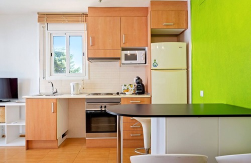 Segur de Calafell Apartment | Apartment 'Dorada 1-2' with Shared Pool, Shared Garden and Wi-Fi