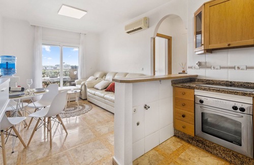 Lo Pagan Apartment | Apartment '1209golfdbeach' with Shared Pool, Wi-Fi and Air Conditioning