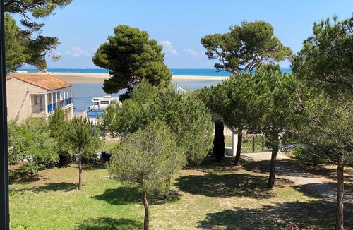 La Franqui Apartment | Apartment for 4 people, near beach, parking, terrace, shops nearby