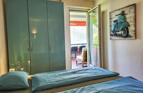 Bissone Apartment | Apartment Frontlake Panorama Apt- 408 by Interhome