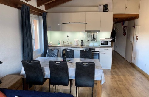 Surcuolm Ski Chalet | Apartment house Surselva, directly on the ski piste