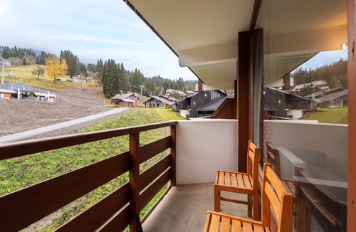Les Esserts Apartment | Apartment in Morillon with Pool & Mountain Views