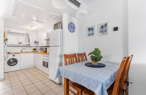 Flamenca Beach Apartment | Apartment 'In Playa Flamenca' with Shared Pool, Wi-Fi and Air Conditioning