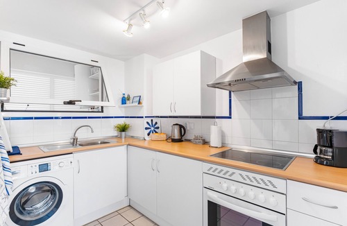 Flamenca Beach Apartment | Apartment 'In Playa Flamenca' with Shared Pool, Wi-Fi and Air Conditioning