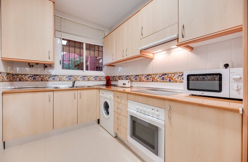 Urbanizacion Hacienda las Chapas Apartment | Apartment 'La Reserva' with Sea View, Wi-Fi and Air Conditioning