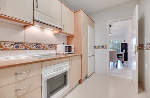 Urbanizacion Hacienda las Chapas Apartment | Apartment 'La Reserva' with Sea View, Wi-Fi and Air Conditioning