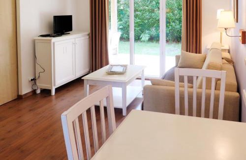 Parentis-en-Born Apartment | Apartment Les Cottages du Lac T1 Tradition by Interhome