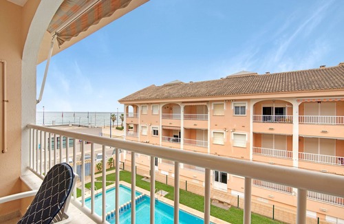 Miramar Beach Apartment | Apartment 'Mar Mediterrània Miramar' with Sea View, Shared Pool and Wi-Fi