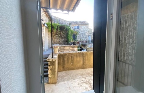 Orgnac-l'Aven Apartment | Apartment 'Micocoulier De La Maréchale' with Mountain View, Shared Pool and Wi-Fi