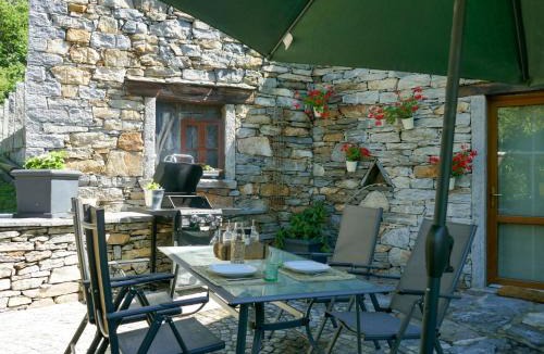 Malvaglia Apartment | Apartment Open Space with Patio by Interhome