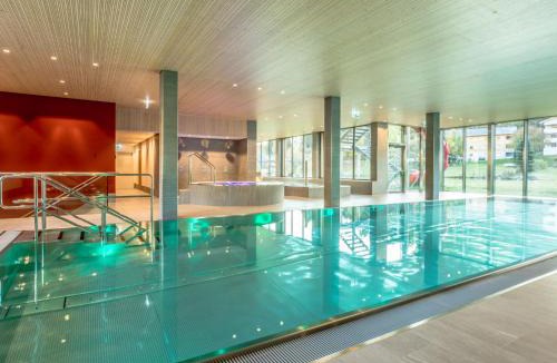 Rueun Apartment | Apartment Pradas Resort - 2-5 Zimmer Premium by Interhome