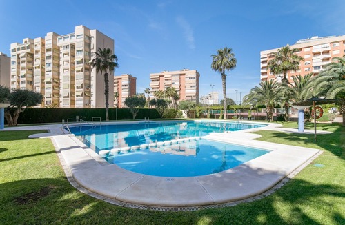 Playa de San Juan Apartment | Apartment 'Urbanización Bulevar Playa' with Shared Pool, Wi-Fi and Air Conditioning