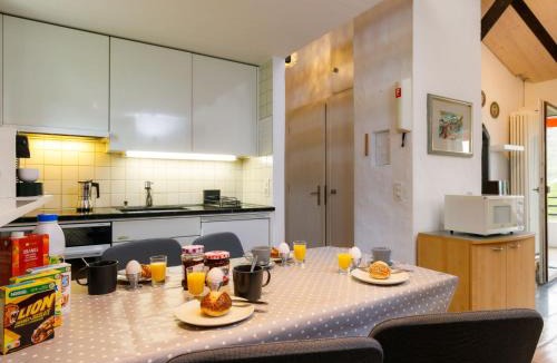 Capriasca Apartment | Apartment Villaggio Sureggio - App- C1 by Interhome
