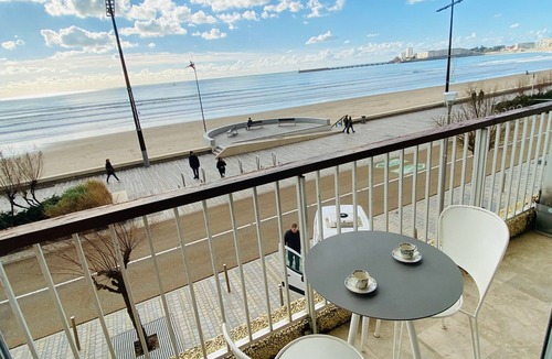 Les Sables d'Olonne Apartment | Apartment with direct beach access, balcony, and private garage
