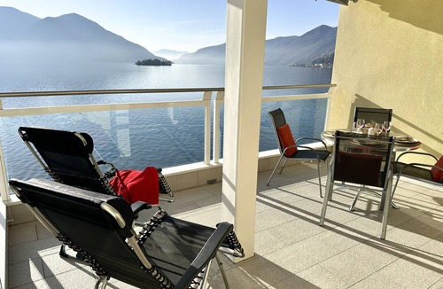 Ronco sopra Ascona Apartment | Apartment with a breathtaking panorama, private lake access and raft