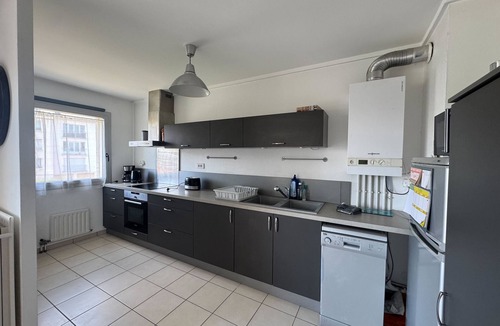 La Pierre-Heuze Apartment | Apartment with balconies close to beaches