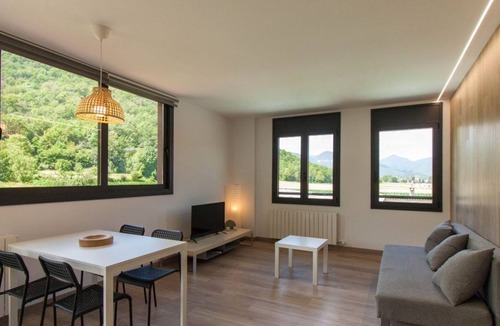 La Vall de Bianya Apartment | Apartment with large terrace and mountain views