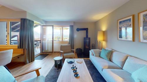 Valbella Apartment | Apartment with Fireplace & Mountain View