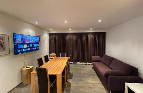 Laax Apartment | Apartment with Pool, Sauna & Gym