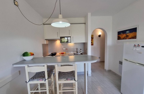 Pedrinya Apartment | Apartment with sea view terrace and pool 50m from the beach
