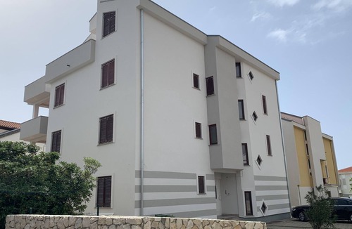 Novalja Apartment | Apartment with Terrace and Partial Sea View and grill
