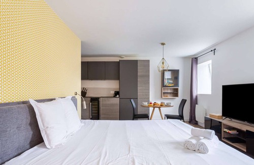 Jean Jaures Apartment | Apartments with a large queen-size bed.