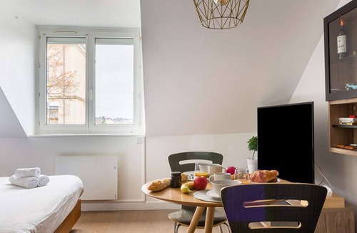 Jean Jaures Apartment | Apartments with a large queen-size bed.