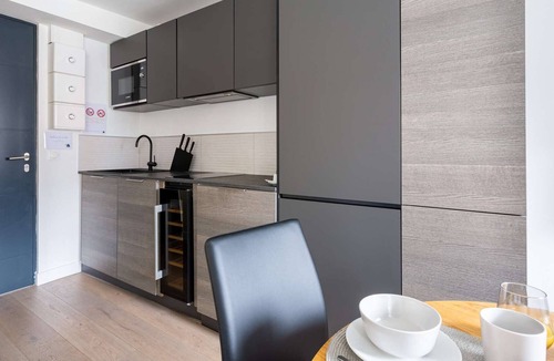 Jean Jaures Apartment | Apartments with a large queen-size bed.