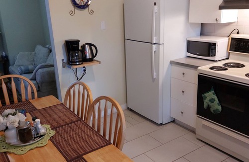 Longueuil Apartment | Appartements Cartier. Free parking. Backyard.