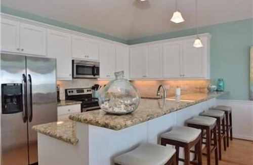Gilchrist House | Aquamarine: 3 BR, 2 BA House in Gilchrist, Sleeps 11