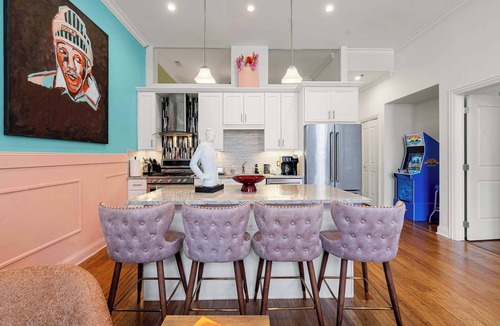 Near West Side Apartment | Arcade, Free Parking, Sleeps 8!