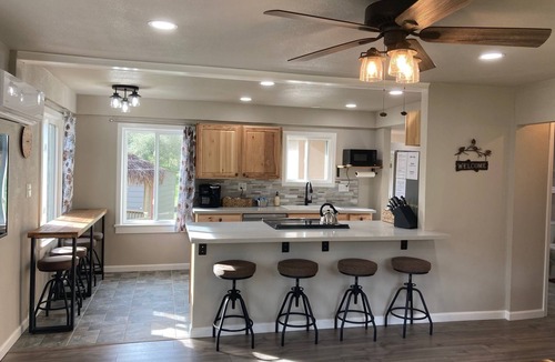 Three Rivers Cottage | Arcade Games/Shared Pool/Walk to Town/Large Deck with Mountain Views