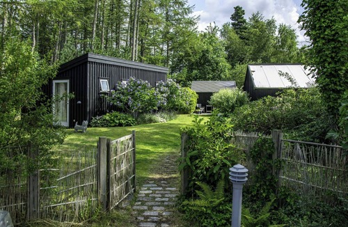 Udsholt House | Architect-designed holiday home by forest