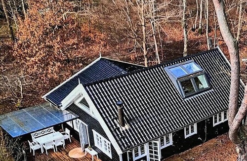 Ramlose House | Architect's timber house in woods by Tisvilde