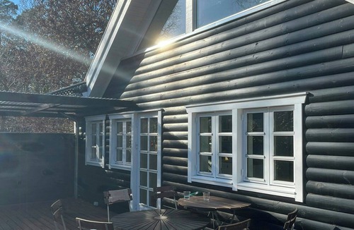 Ramlose House | Architect's timber house in woods by Tisvilde
