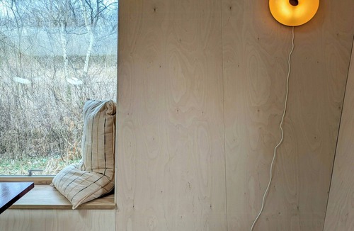 Hoeve Strand House | Architectural tiny house with sauna near beach