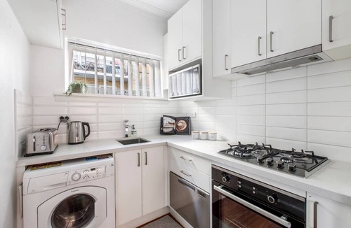 Elwood Apartment | Art Deco Modern within Elwoods Inner city Scene