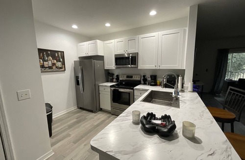 Riverview Condo | Artful Haven: A Stylish Escape