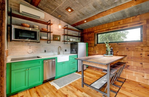 Elgin House | Artisan Cabin with Beautiful Decor and a Classic Fire Pit near Austin, Texas