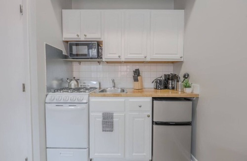 Prudential - St. Botolph Apartment | Artisan Studio with Exposed Brick