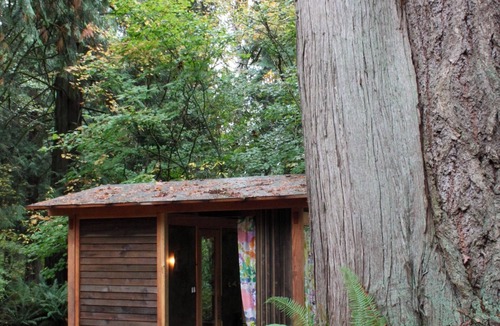 Geneva House | Artists Stone Cabin with Bathhouse, Sauna & Cedar Soaking Tub