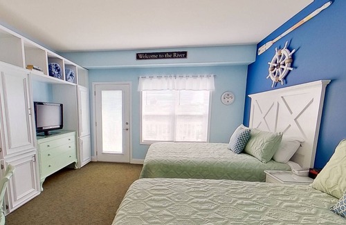 Southport Condo | Ask about low weekly rates - Amazing Water & Sunset Views- Just Blocks From Southport! Gorgeous Pool