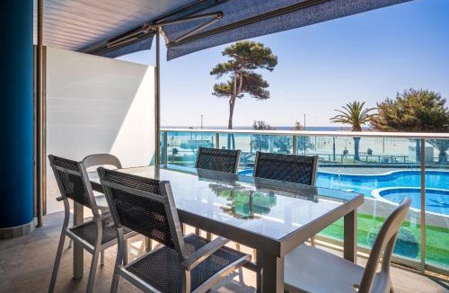 Torredembarra Apartment | AT021 Apartment with pool in front of the beach