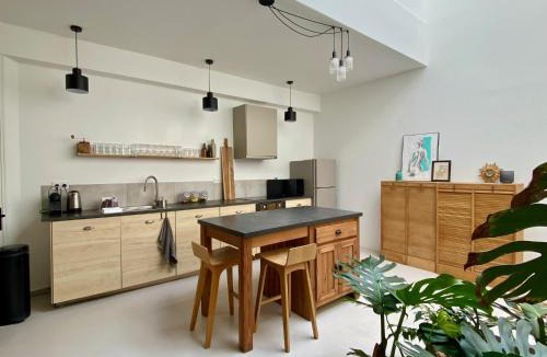 La Fayette-Eble House | Atelier Audusson - Espace atypique aux jardins intérieurs