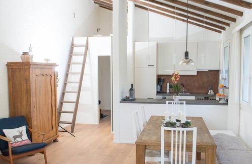 Lenzerheide Apartment | Attic apartment with pool, sauna, and fireplace