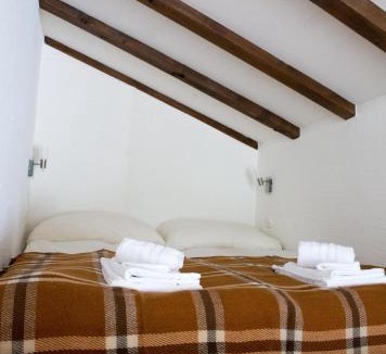 Lenzerheide Apartment | Attic apartment with pool, sauna, and fireplace