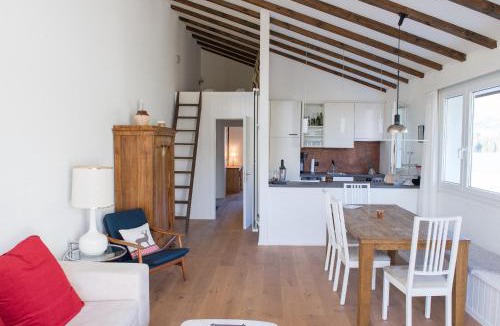 Lenzerheide Apartment | Attic apartment with pool, sauna, and fireplace