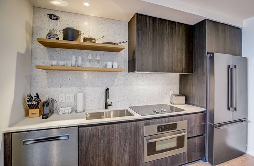 Rainey Street Historic District Apartment | Austin Rainey Street studio - lake & skyline-view balcony, rooftop pool & gym
