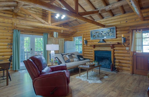 Enchanted Oaks Cabin | Authentic log cabin on Cedar Creek Lake - spectacular views from all 3 decks